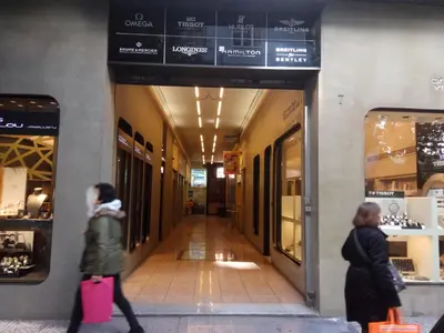 two women walking down a hallway in a store at TONI'S Studio Syntagma, 1 min from Metro station in Athens