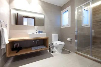 a bathroom with a toilet and a sink and a shower at TONI'S Grande Home next to A.Museum in Athens