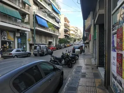 a street with motorcycles parked on the side of the road at TONI'S 2BD Home for Superman and Superwoman. in Athens