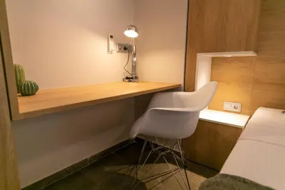 a small room with a desk and a bed at TONI'S makes you an offer, you cannot refuse. in Athens