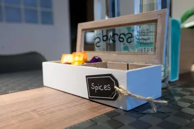 a box of spices sitting on top of a table at TONI'S 3BD Amazing Home for Wizards and families! in Athens