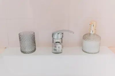 a bathroom sink with a soap dispenser and a faucet at BEST HOUSE, Attiki Metro, Athens in Athens