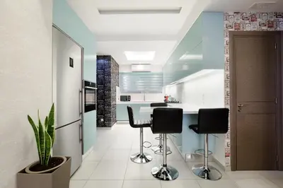 a kitchen with a white counter and black stools at Near Acropolis brand new 1 min from metro in Athens