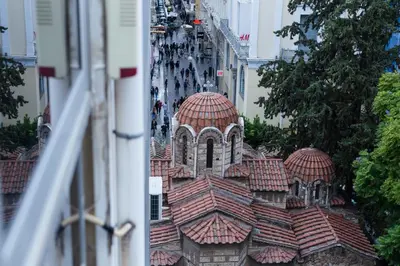 a view of a building with tile roofs and a street at Ermou str. Elegant Apartments by UPSTREET in Athens