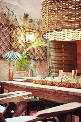a restaurant with a table with baskets on it at Art Pantheon - Suites & Apartments in Athens