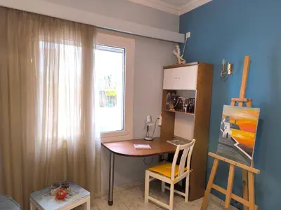 a room with a table and a window and a desk at Casa Bonita, House with Private Entrance and Garden, between center and sea in Athens