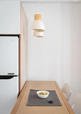 a kitchen table with a bowl of candy on it at Acropolis Cozy Living in Athens