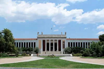 a large building with columns in a park at Superior Central Apt|3min to Metro|AC|Netflix|iMac in Athens
