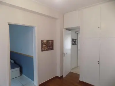 a room with white walls and a blue and white door at George's Apartment in ''Pedion Areos'' area in Athens