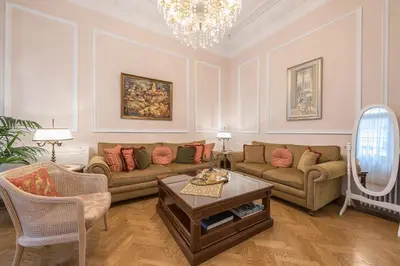 a living room with two couches and a table at The Rare Luxury Gem in Kolonaki Sq - near Syntagma in Athens