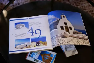 a book sitting on top of a table at El Pacífico in Athens