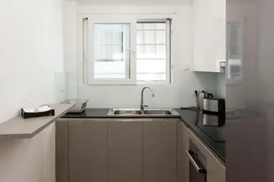a kitchen with a sink and a window at Lovely 2 bedroom apt in Metaxourgio Center in Athens