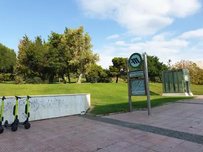 a speed limit sign with skis next to a park at Comfortable & Convenient Living in Athens in Athens