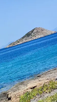 an island in the middle of a body of water at Serenity Villa-1st floor-Panoramic Sea view- sea 150m away in Porto Rafti