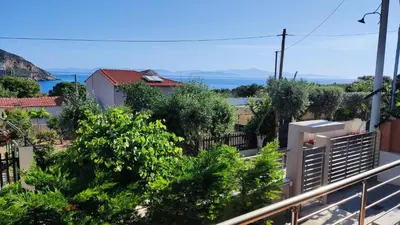 a view from the balcony of a house at Serenity Villa-Ground floor-Sea view- sea 150m away in Porto Rafti