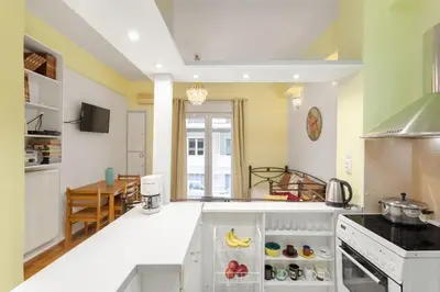 a kitchen with white counters and a stove top oven at Athens Home 2 in Athens