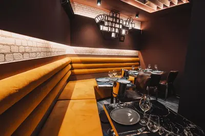 a restaurant with tables and chairs in a room at Project 3 Urban Chic Hotel in Athens