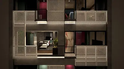 a tall building with lights on the side of it at Project 3 Urban Chic Hotel in Athens