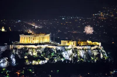 a view of the acropolis at night at Acropolis amazing balcony view 3 minutes walking to the museum in Athens