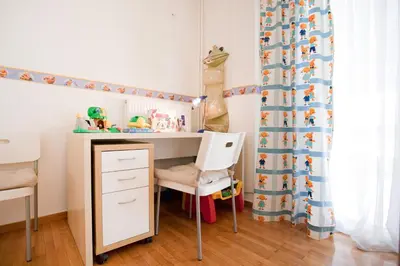 a childs bedroom with a desk and a chair at Acropolis area 5 minutes to the Museum and metro in Athens