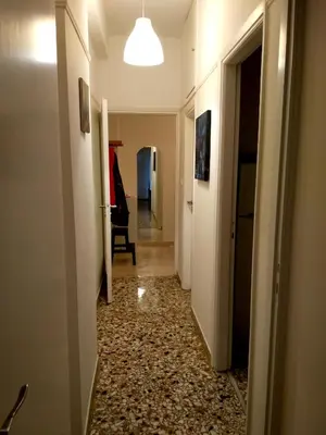 an empty hallway with a hallway at Archelaou Street Living in Athens