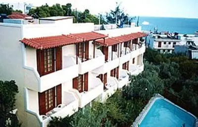 an aerial view of a building with a swimming pool at Voula Apartments in Agia Marina Aegina