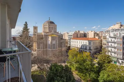 a view of a city from a balcony at Cathedrals square supreme residence in Athens