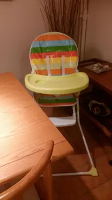 a colorful chair sitting in front of a desk at Comfortable garden Apt near Vouliagmeni beach in Athens