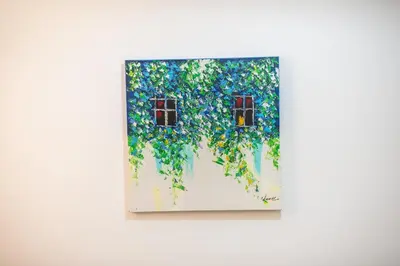a picture of two windows in a painting on a wall at Splash of Glam III 10 steps from Acropolis in Athens