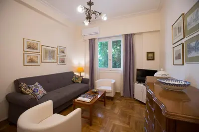 a living room with a couch and a table at 