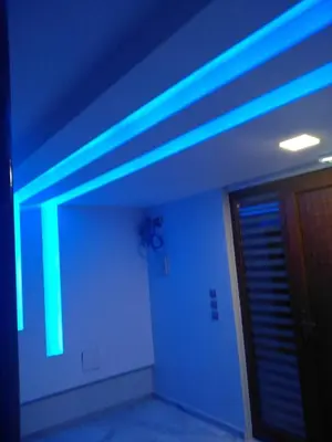 a room with blue lights on the ceiling at Paidon Studio in Athens