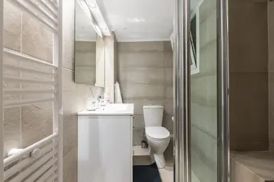 a small bathroom with a toilet and a sink at Athens Centre Flat 2 min. from Evangelismos Metro in Athens