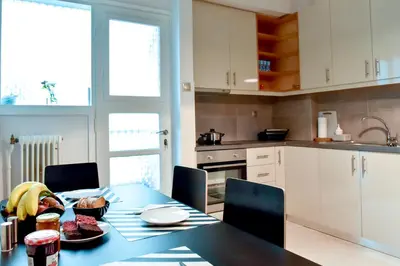 a kitchen with a table with bananas on it at 20 times Athens in Athens