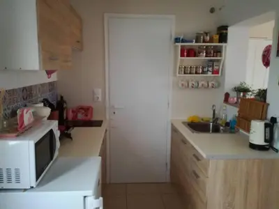 a kitchen with a microwave and a sink at LITTLE HOUSE ON THE ROOFTOP in Athens