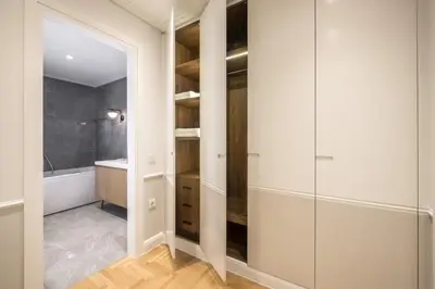 a bathroom with a walk in shower and a tub at Chic central Athens apartment at Mavilli Sq. in Athens