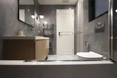 a bathroom with a sink and a toilet in it at Chic central Athens apartment at Mavilli Sq. in Athens