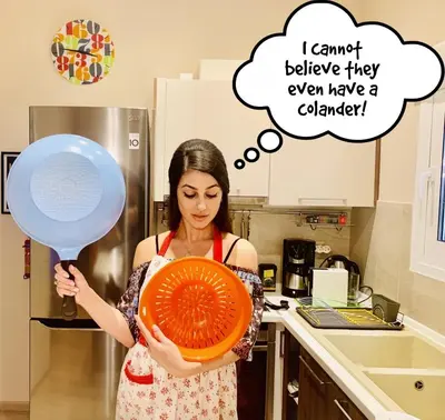 a woman holding an orange plate and a balloon at Bring only your toothbrush! in Athens