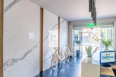 a lobby with two bikes parked against a wall at Chroma Fashion Rooms & Apartments in Athens