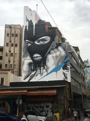 a building with a painting of a cat on it at Miaouli8 in Athens