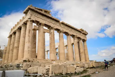 an ancient building with columns in front at M&D Luxury Suites in central Athens in Athens