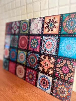 a bunch of colorful tiles on a wall at My Way Hotel in Athens