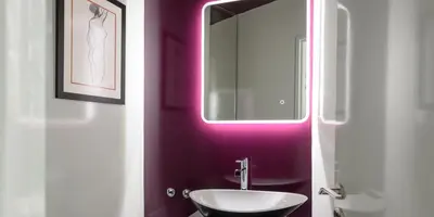a bathroom with a sink and a mirror at Fos Residential Apartments in Athens