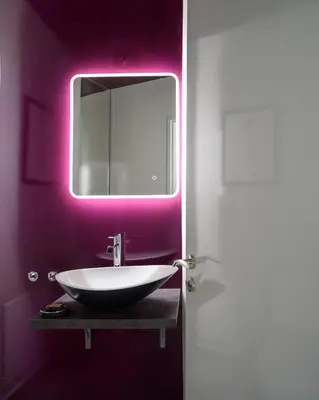 a bathroom with a sink and a mirror at Fos Residential Apartments in Athens