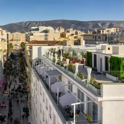 an aerial view of a city with buildings at Elia Ermou Athens Hotel in Athens