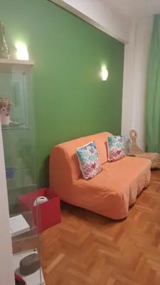 a room with a bed with two pillows on it at By Lycabettus in the city-heart close to Acropolis in Athens