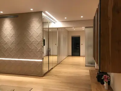 a hallway with a glass elevator in a building at Luxury & Stylish Family Apartment in Athens