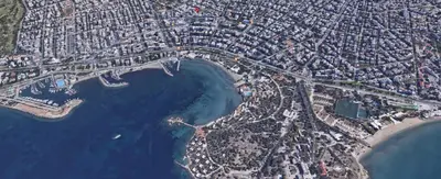 an overhead view of a city with a harbor at Luxury & Stylish Family Apartment in Athens