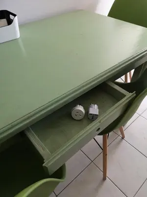 a green desk with a green chair next to it at Athenian Luxury apartment, near metro station Chalandri, Nu 2 in Athens