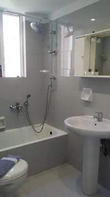 a bathroom with a shower and a sink and a toilet at Athenian Luxury apartment, near metro station Chalandri, Nu 2 in Athens