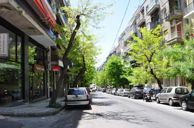 a car parked on the side of a city street at Nadia's apartment , Athens in Athens